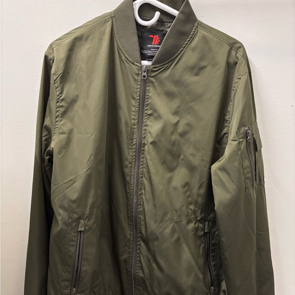 Men’s Medium dark green bomber jacket. Worn only once